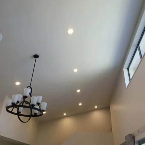 New ceiling with recessed downlights and a pendant fitting